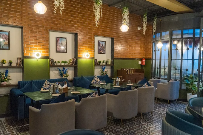 Brick, low lamps and the long banquette along the wall